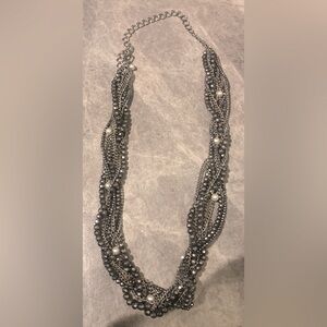 Long shiny twisted necklace